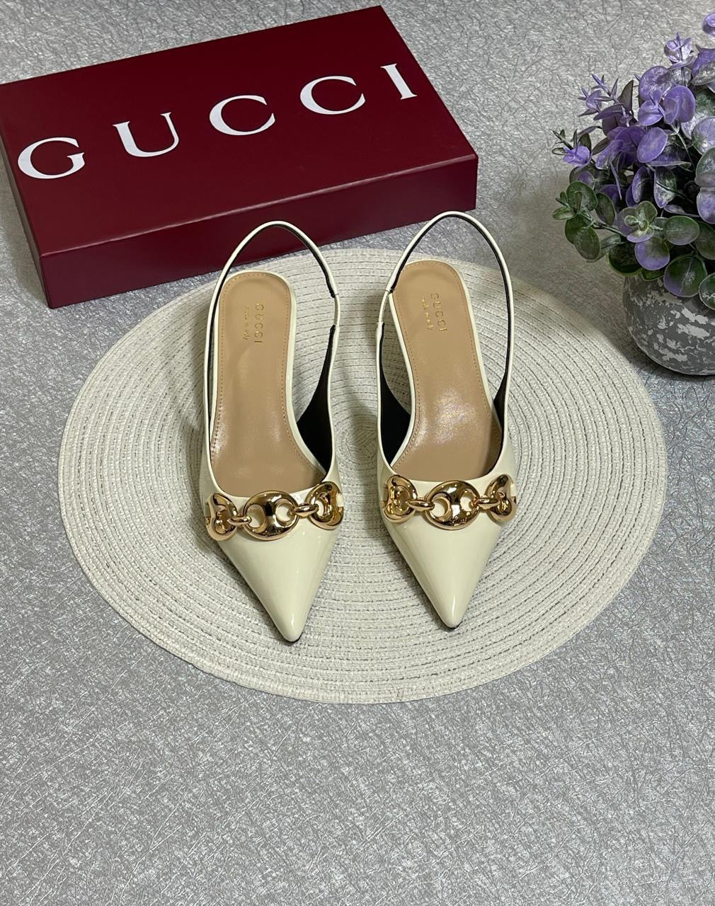 Gucci heels white