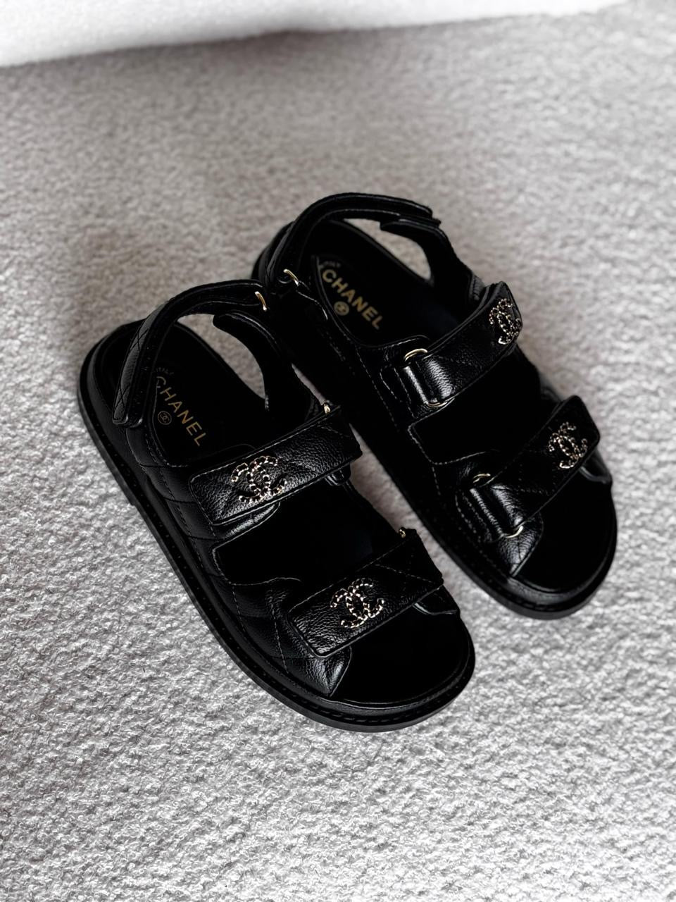 Chanel sandals.