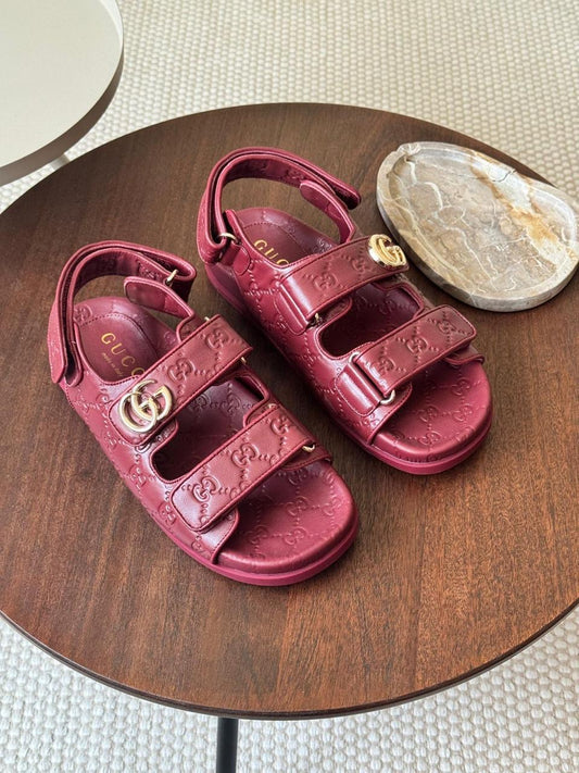 Gucci sandals.