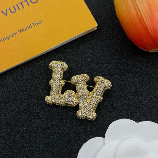 Lv brooch