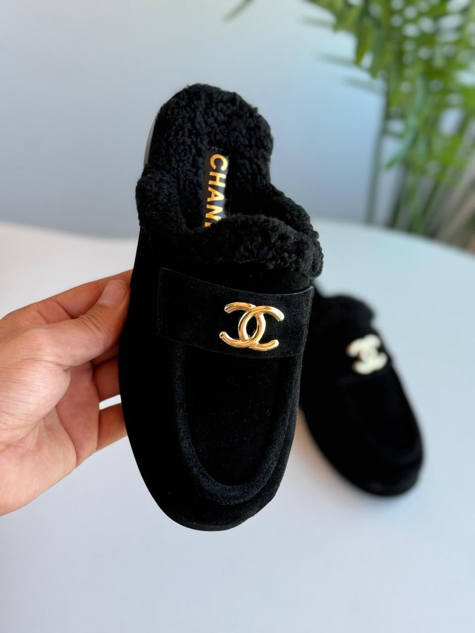 Chanel mules with fur