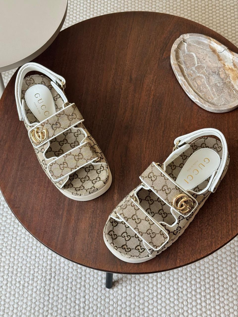 Gucci sandals.