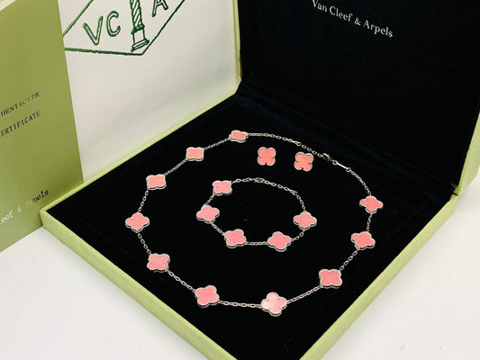 Van cleef jewelry set silver color