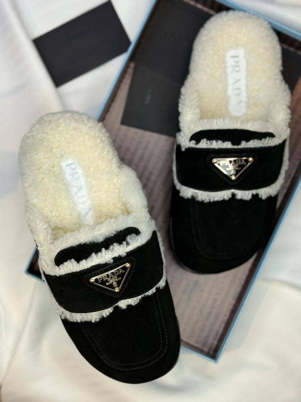 Prada mules with fur
