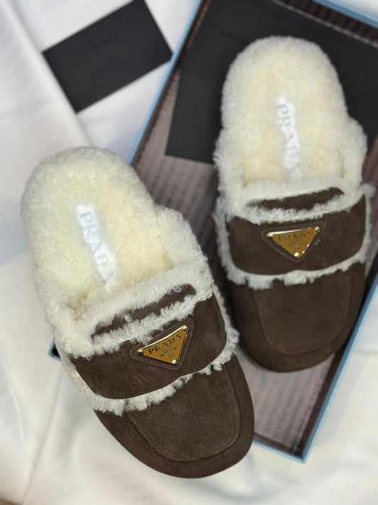 Prada mules with fur