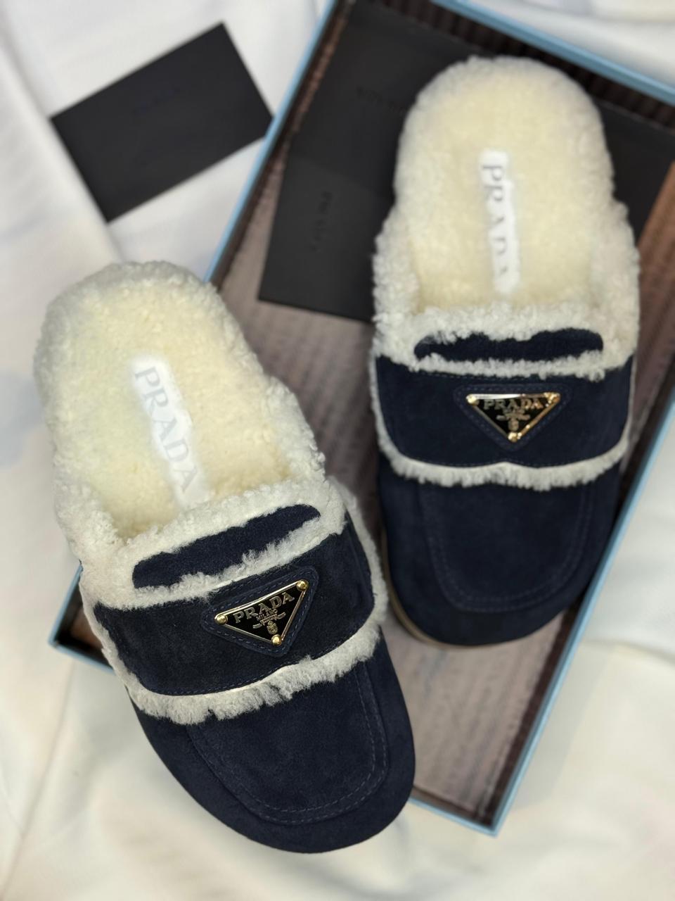 Prada mules with fur
