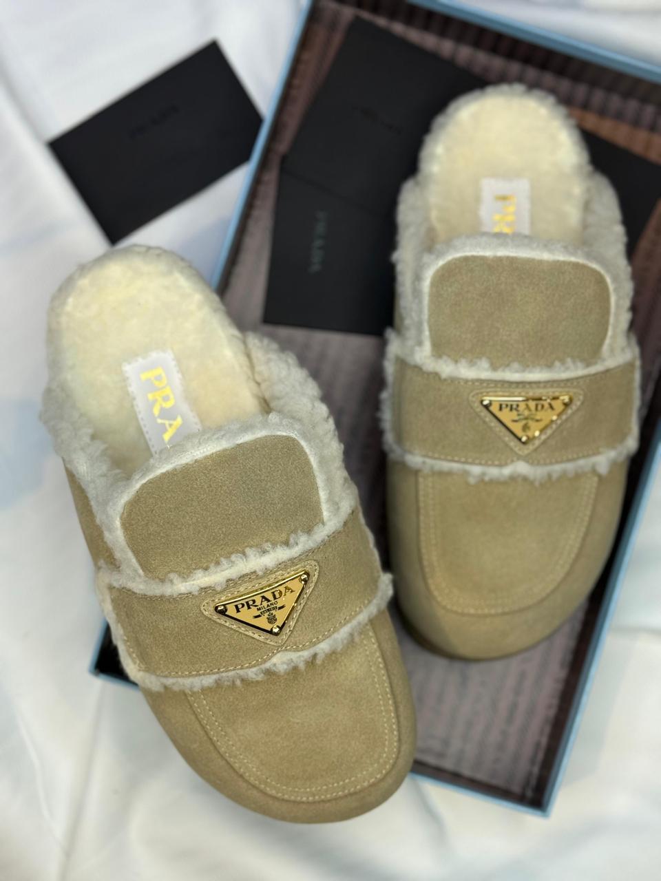Prada mules with fur