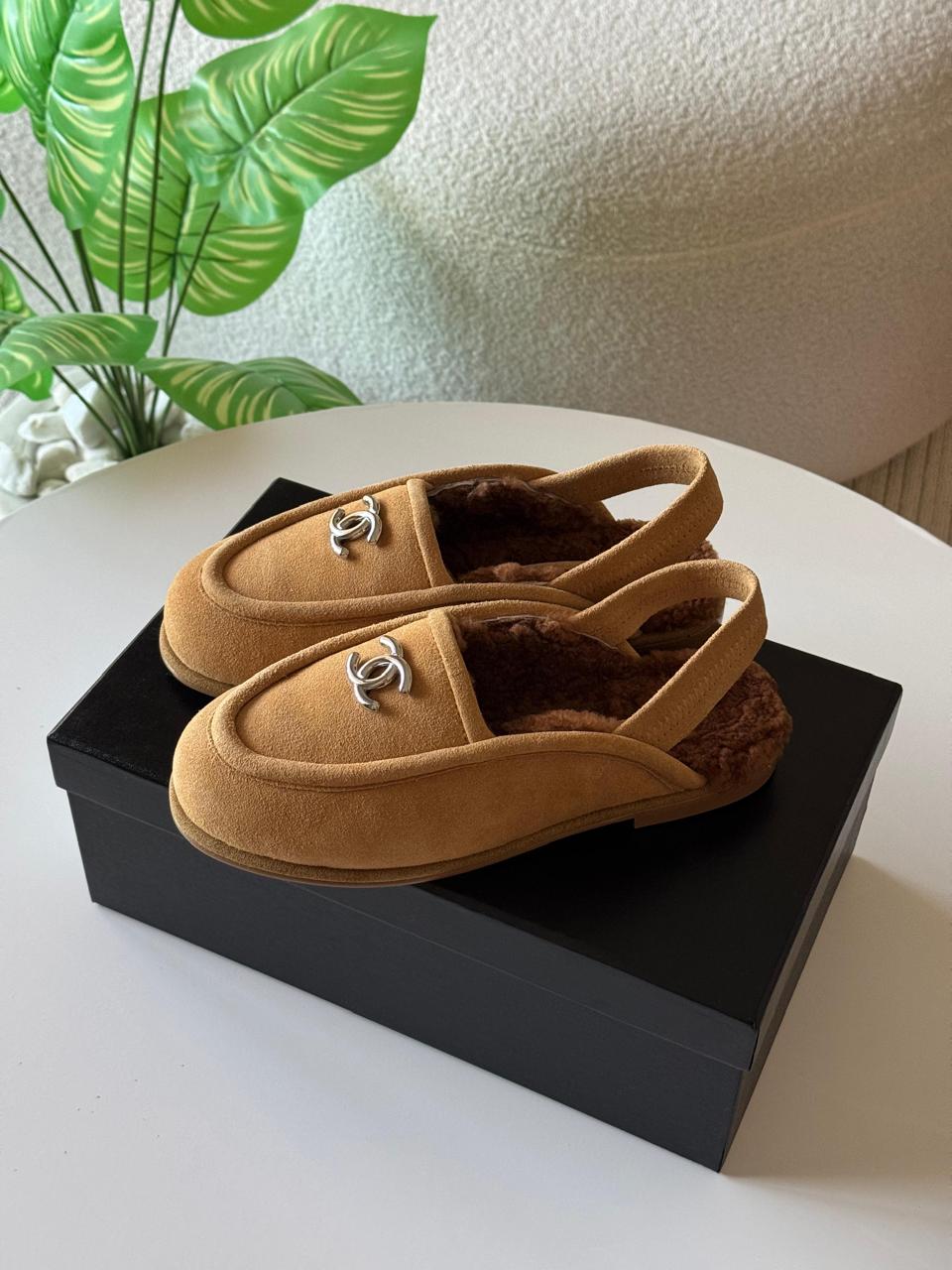 Chanel loafers with fur