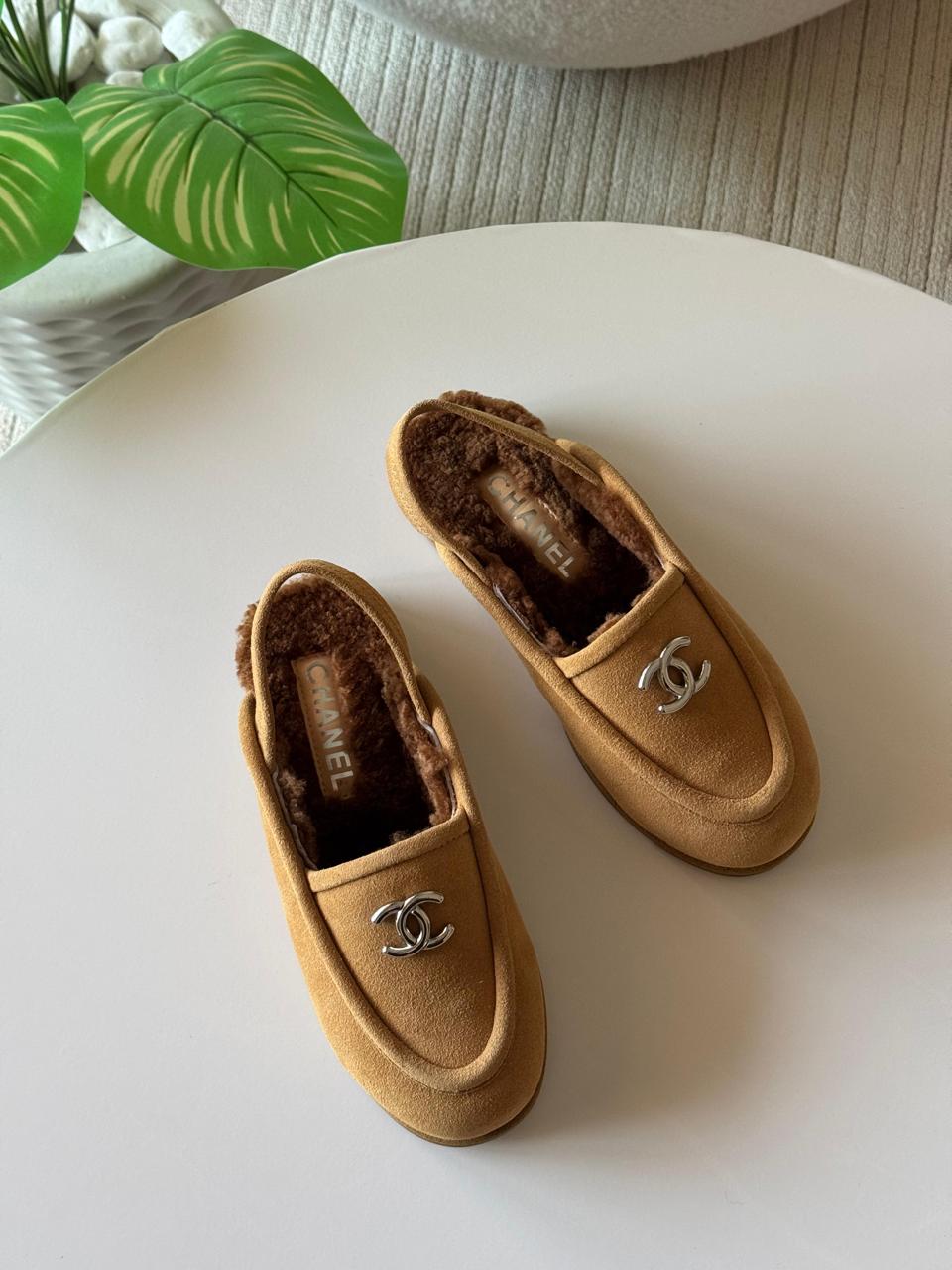 Chanel loafers with fur