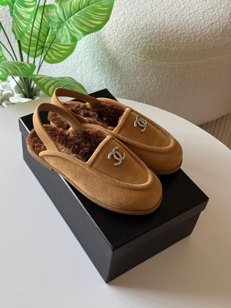 Chanel loafers with fur