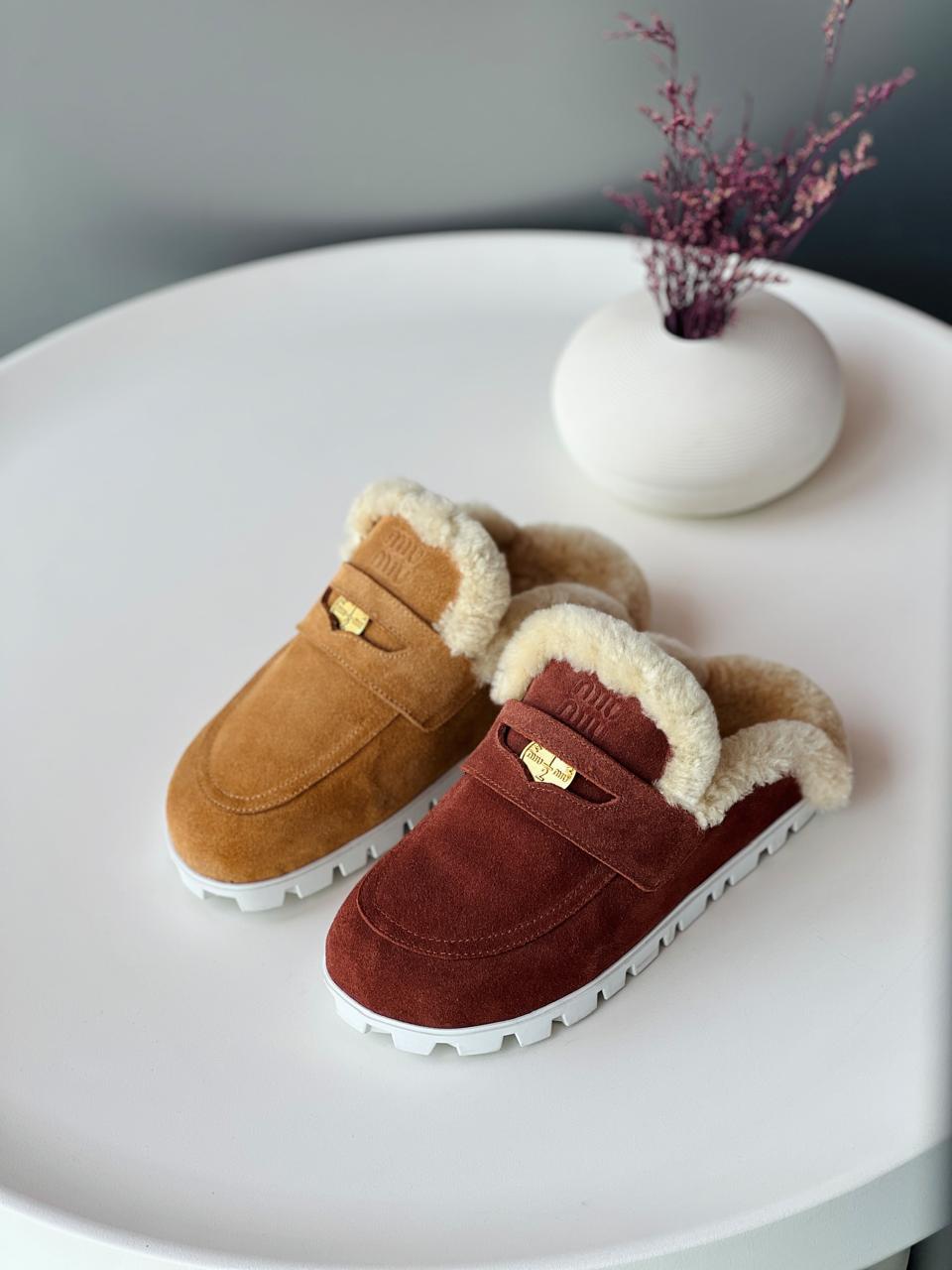 Miu Miu mules with fur